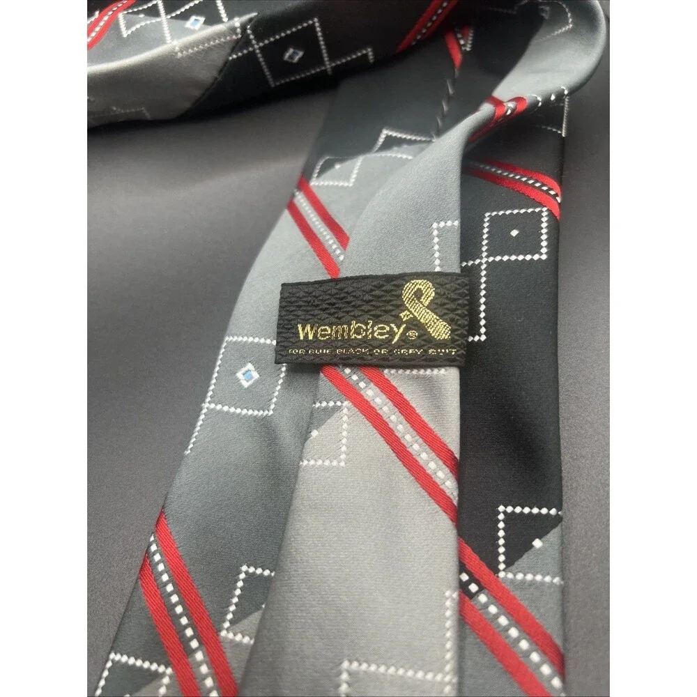 Wembley Geometric necktie. Woven. France. Gray, Black,Red, Blue